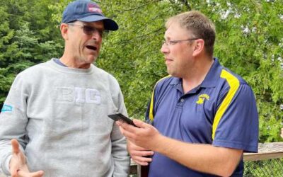 Michigan Wolverines football team blitzes the area